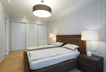 Modern Interior of the bedroom in the apartment..