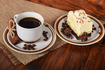 black coffee in a cup with chocolate cake with free space for text