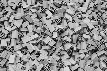 Black and white background of stack bricks prepare to construction building