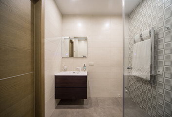 Fototapeta na wymiar Bathroom and toilet in the modern apartment.