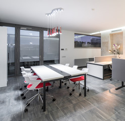 Hall of the Modern design office in red and white colors.