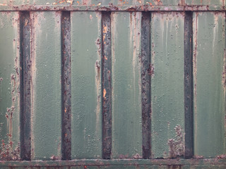 A rusty iron gate. / vintage background
