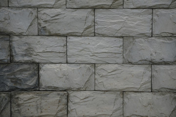 Texture, background. decorative brick, building decoration. a small rectangular block typically...