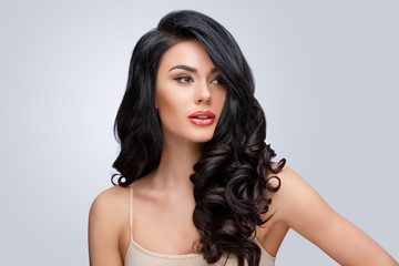 Naklejka premium Beautiful Young Woman with Clean healthy curly hair