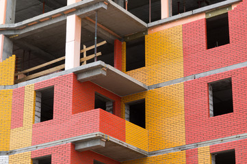 View of the construction of the red and yellow house