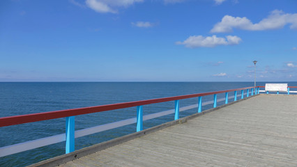 Obraz premium Beach in Palanga. One of the most popular Lithuanian beaches with a long pier, a sandy place frequented by tourists in the summer. Popular tourist resort.