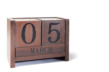 Wooden Perpetual Calendar set to March 5th