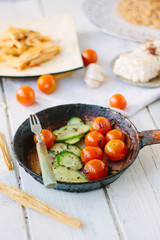 Fresh and juicy roasted tomatoes and cucumbers.