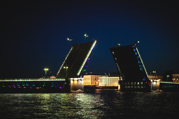 Classic symbol of St. Petersburg White Nights - a romantic view of the open Palace Bridge