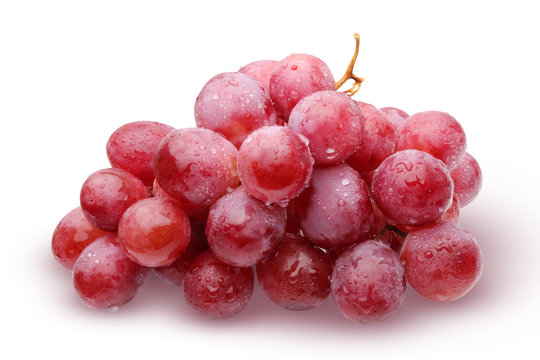 Bunch of red grapes on a white background.