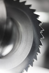 Vertical Saw and Coil as and abstract background