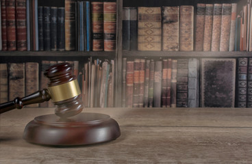  law theme, mallet of the judge, wooden desk, old books