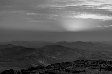White and black sunrise morning landscape on holy land judean desert in Israel