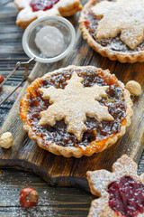 Tartlets with dried fruits, orange jam and nuts.