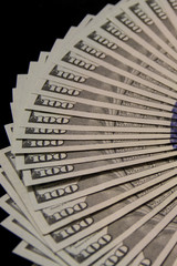 American dollars lie in a circle. Fan of money.