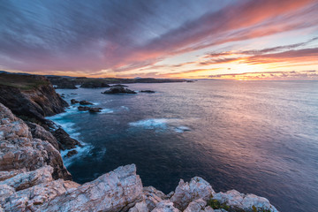 the clouds reach spectacular colors at sunset in the Atalaya