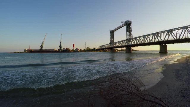 A moveable bridge across the mouth of the Dniester in Zatoka (Ukraine). Vertical-lift bridge.