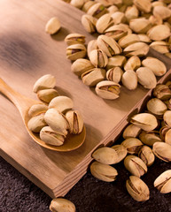 pistachios on wooden board