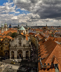 Naklejka na ściany i meble The roofs of old Prague. View from the tower of the Charles Brid