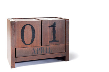 Wooden Perpetual Calendar set to April 1st, April Fools Day