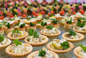 buffet table salad in tartlets