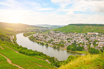 Moselle Valley Germany: View from Landshut Castle to the old town Bernkastel-Kues with vineyards and river Mosel in summer, Europe