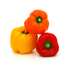 Obraz na płótnie Canvas Fresh yellow, red and orangebell peppers isolated on white