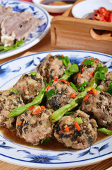 Stewed pork ball with preserved mustard in brown sauce, Taiwan style.