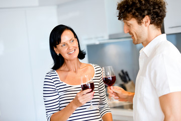 Portrait of a couple having a glass of red wine