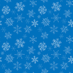 Seamless pattern of hand-drawn black-and-white snowflake 