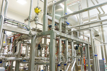 Industrial factory equipment stainless tubes food automation.