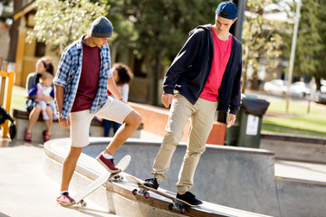 Teenage boy skateboarding outdoors