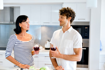 Couple cooking together at home