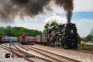 Fototapeta na wymiar Nickel Plate steam locomotive 765 departing Fox Lake, IL