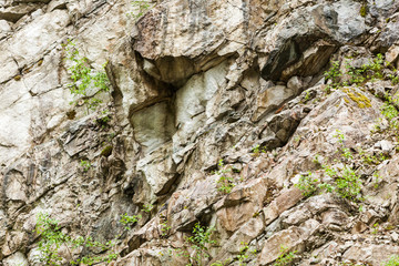 Background of stone wall texture rough rock surface