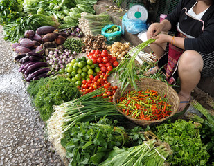 The vegetables in the market look fresh and yummy