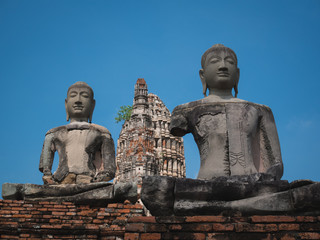 Fototapeta premium Ancient buddha statue of Chaiwatthanaram Temple in Ayutthaya, Thailand