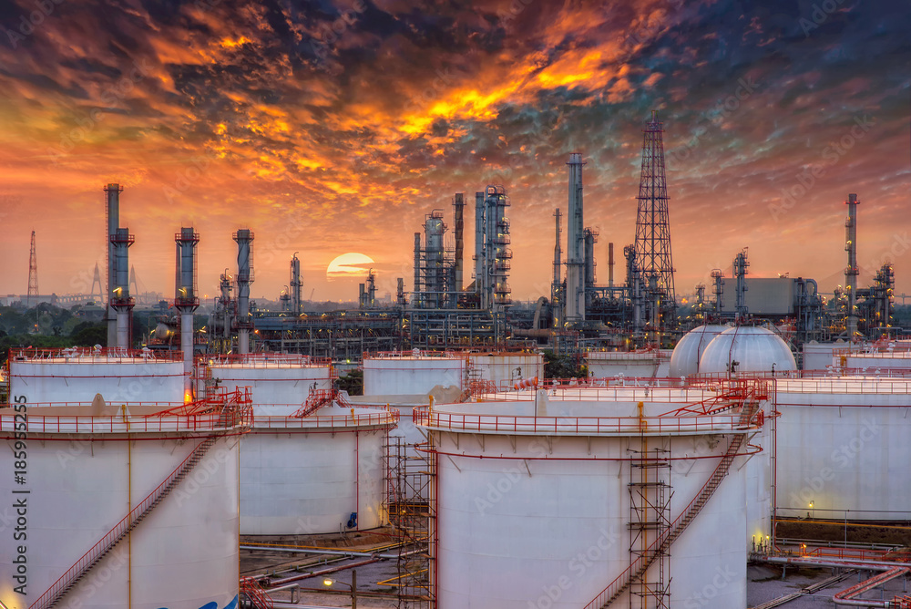 Wall mural refinery at twilight and oil thank petrochemical plant