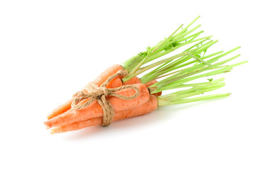 fresh carrot, baby carrot isolated on white background, This vegetable is an exceptionally rich...