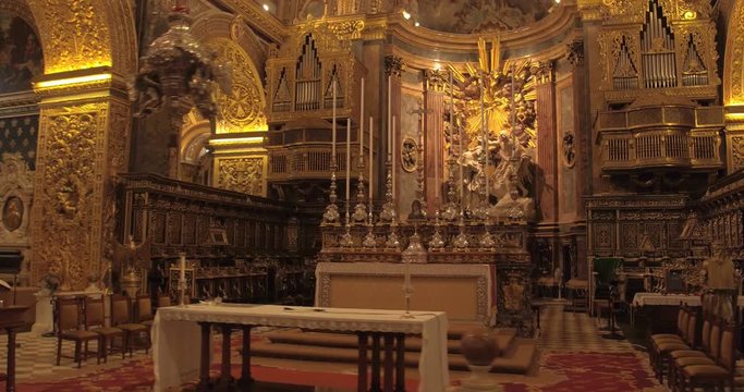MALTA – AUGUST 2016 : Video shot inside Valletta Church with beautiful interior, altar and paintings in view
