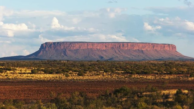 a zoom in close up of mount conner in australia's northern territory at sunset