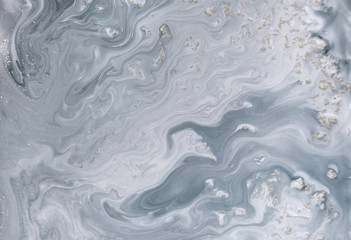 Fototapeta premium Marble abstract acrylic background. Nature marbling artwork texture. Golden glitter.