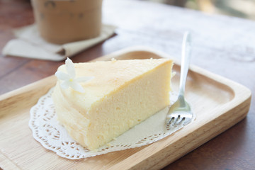 Japanese cheese cake on wooden plate
