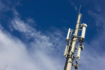cellphone radiomast on december sunny blue sky