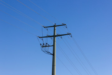 powerpole on december blue sky