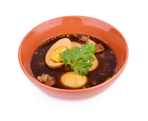 stewed eggs  and pork in brown sauce by Thai food