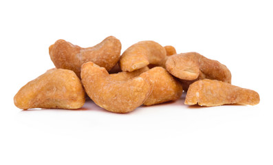 Roasted cashew nuts on white background