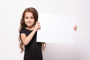 Little girl. White list. Light background