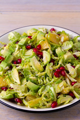 Brussels Sprouts Pomegranate, Avocado, and Citrus Salad, vertical