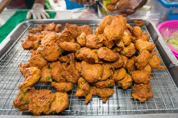 Deep fried Curry paste ocean fish or Fish curry pancake in the market.Thailand.